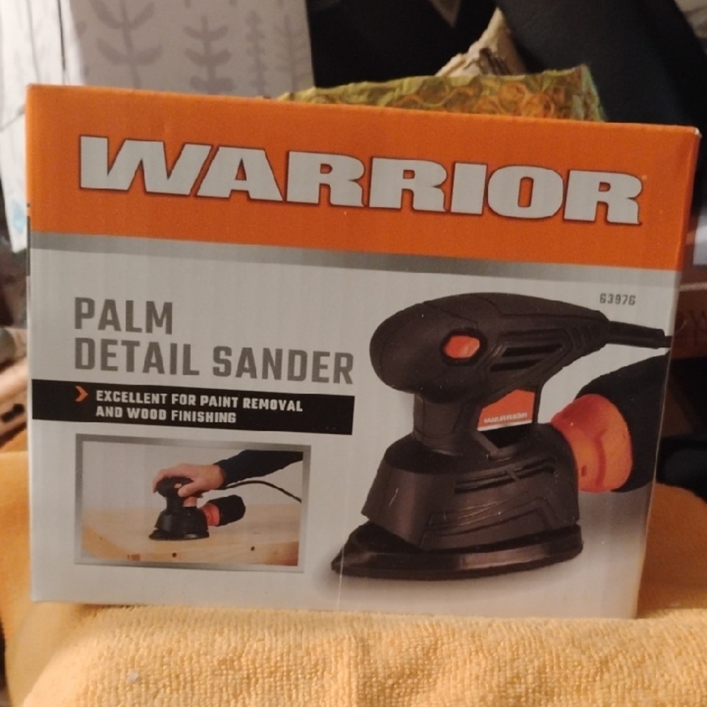 Black and Orange Palm Detail Sander